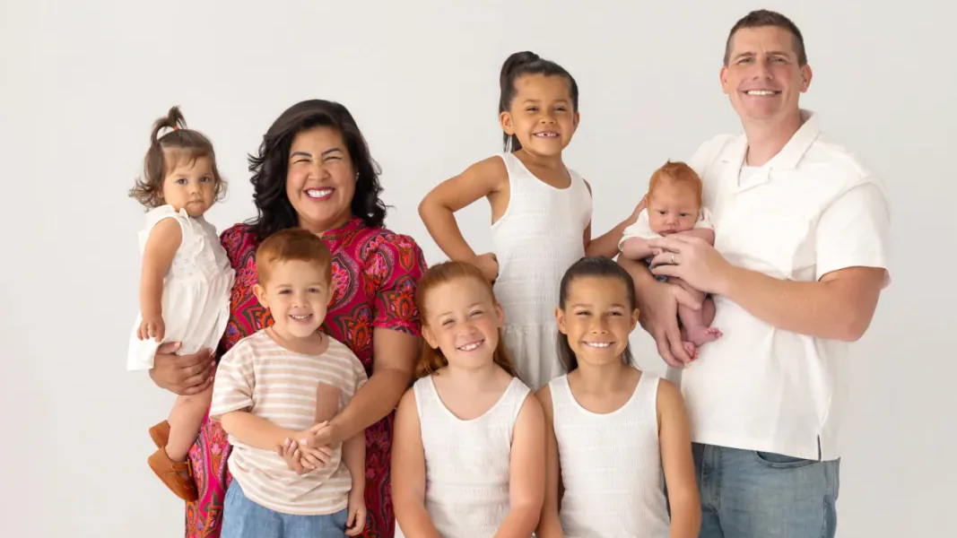 Flor De Maria McNally with her husband and their six children