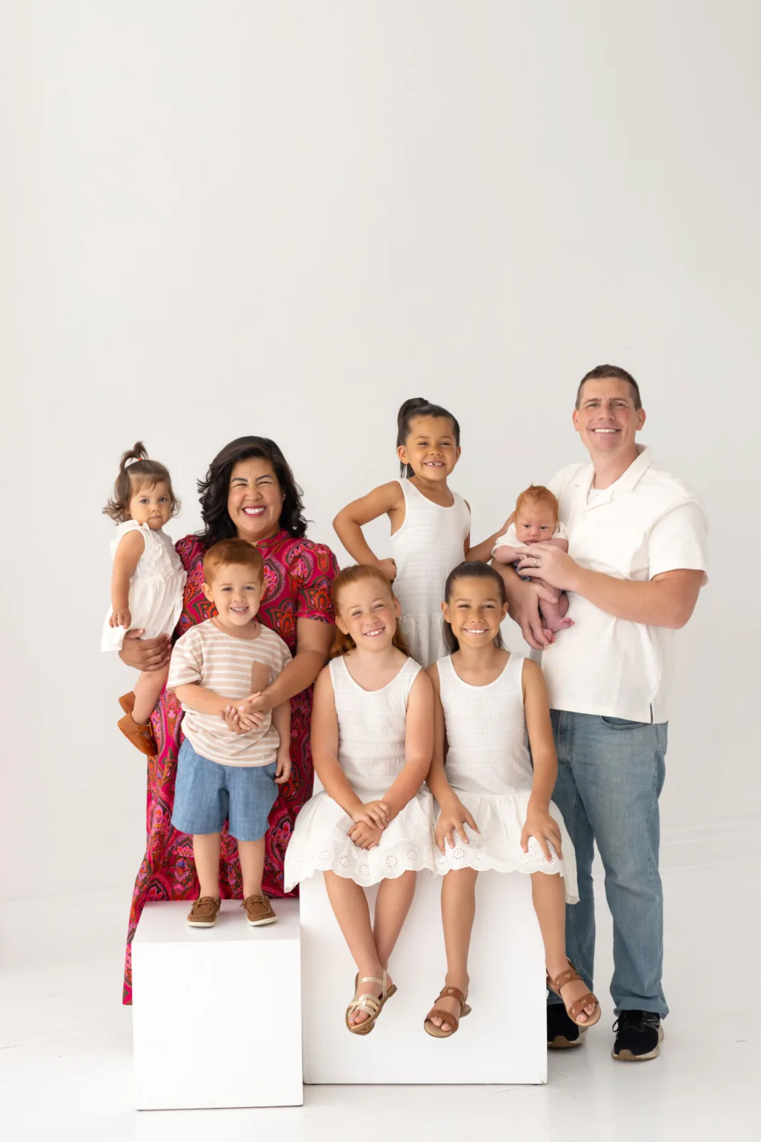 Flor De Maria McNally with her husband and their six children